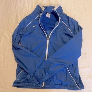 Nike storm fit wind breaker size medium blue white trim great condition one mark